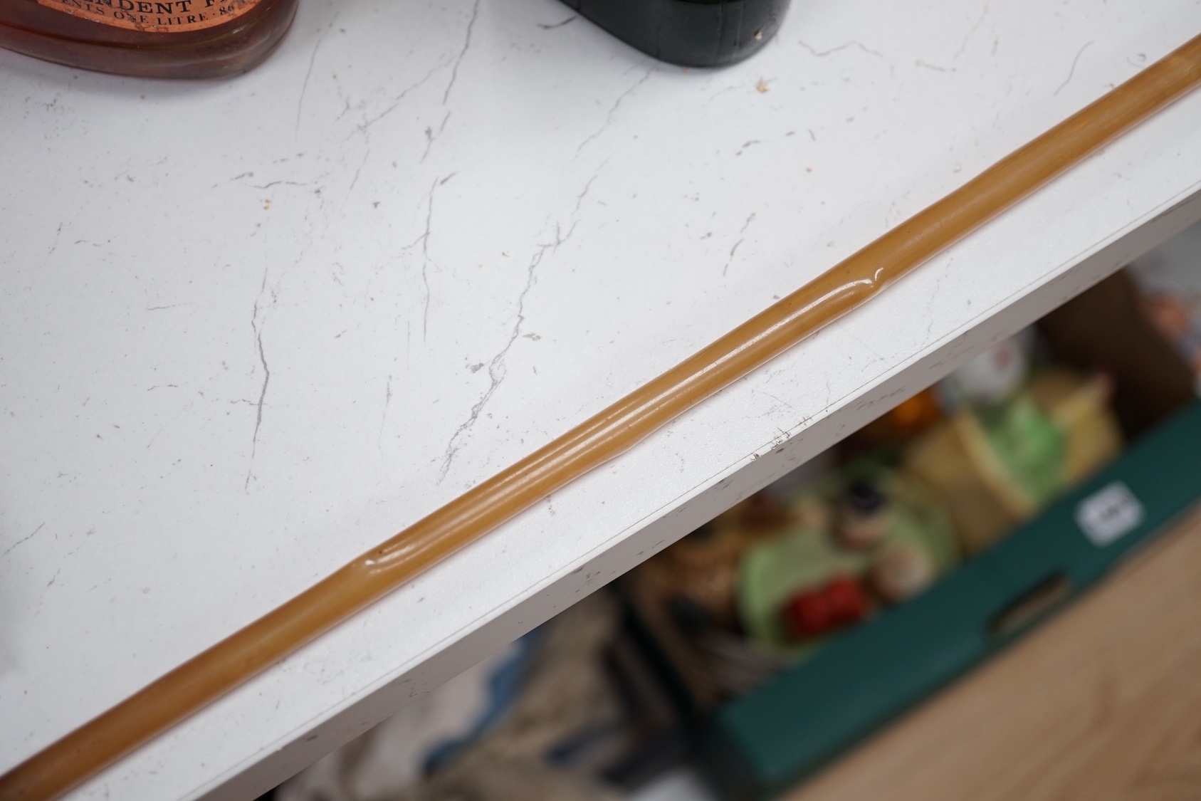 A Yellow-metal mounted horn riding crop, 69cm